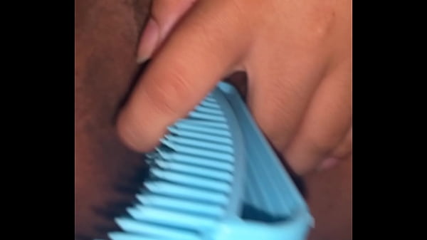 Masturbating with a hairbrush and hairy pussy for my man to see