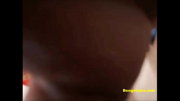 Beautiful gal wildly masturbates both of her holes