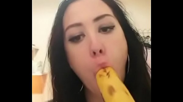 Slut at home practicing deep throat with banana