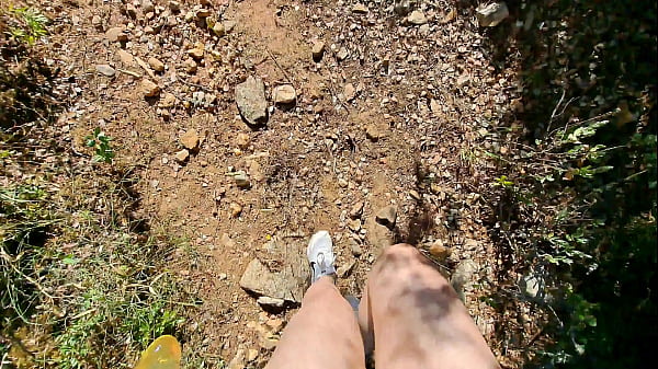 Latina naked outdoors fucks a stranger with a penis extender in a forest
