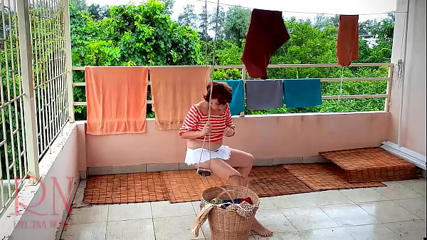 The stupid housewife hangs up the washed laundry. – Free HD Porn Video