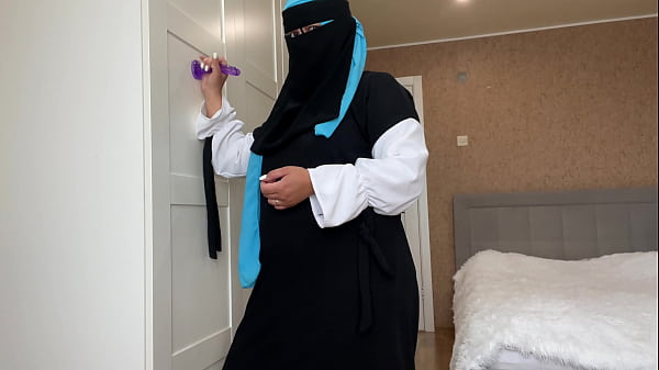 Arab wife in hijab found a sex toy while cleaning and got horny