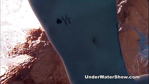 Redheaded cutie swimming nude in the pool – Free HD Porn Video
