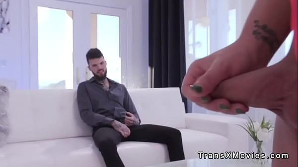 Busty trans in lingerie gets ass fucked by tattooed man