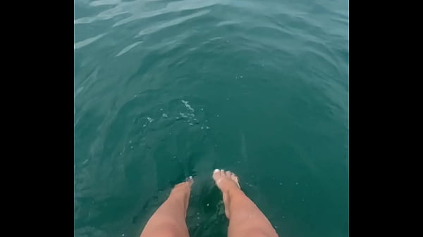 The warm sea water caresses my feet